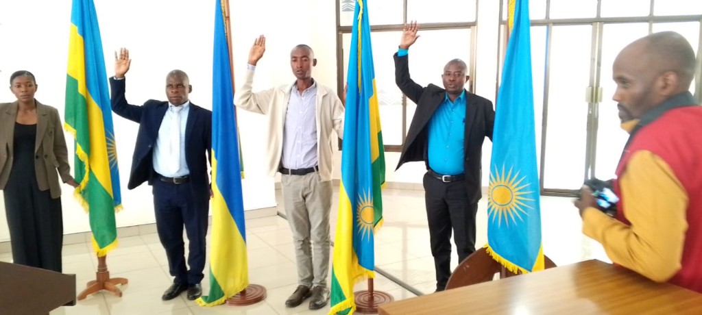Oath of office ceremony with Rwandan flags